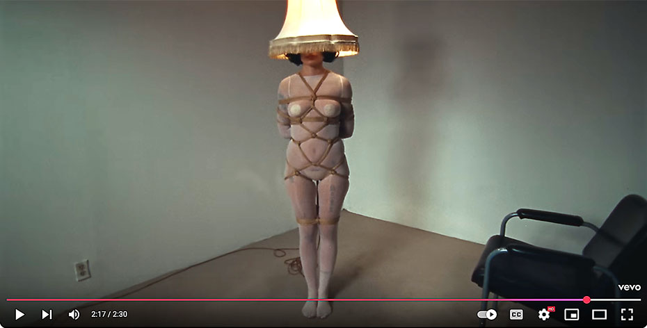 Halsey Safeword video: Finally roped into light duties, Halsey becomes a character from a John Willie cartoon (or a Gord photoshoot)